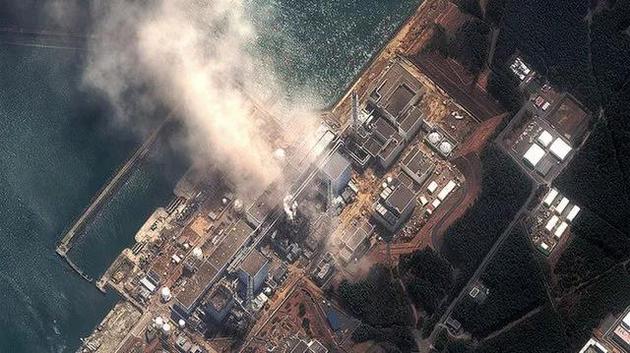 2011年3月14日，福島第一核電站的衛(wèi)星圖片，此時已經有兩個反應堆發(fā)生爆炸